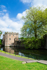 Fototapeta na wymiar Beautiful Canal Around Bishop's Palace, Wells, England