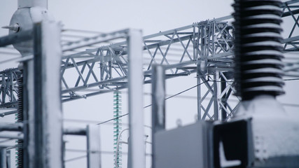 Switchgears and switches in a power plant with steel structure. Power plant detail, high voltage...