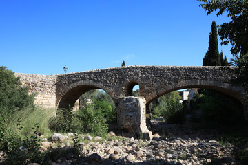 Fototapeta na wymiar Old roman bridge at Pollensa. Mallorca. Spain