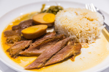 Stewed pork leg on rice.