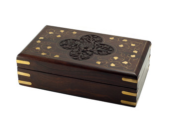 Isolated dark-brown wooden casket with inlay and carved pattern in Indian style