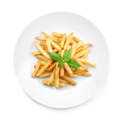 Plate with yummy french fries on white background
