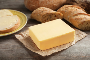 Block of butter on table