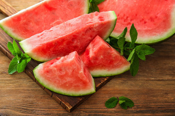 Tasty sliced watermelon on table