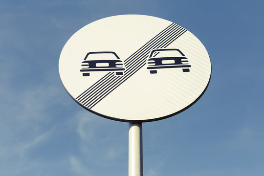 No more restrictions road sign on blue sky background