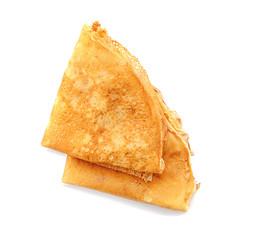 Delicious thin pancakes on white background