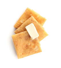 Delicious thin pancakes on white background