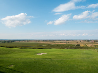 Golf course near vineyards and scenic nature
