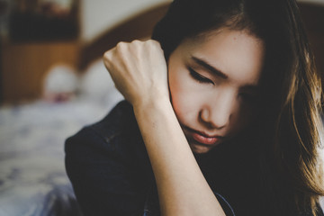 Fototapeta premium sad woman hug her knee and cry