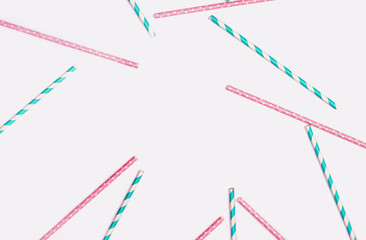 Paper straws background. Holiday and party concept. Toned image, flat lay