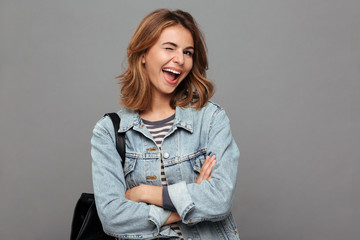 Portrait of a cheerful pretty teenage girl