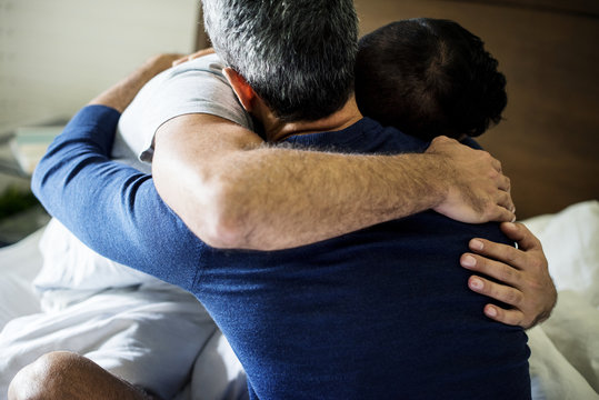 A couple hugging one another