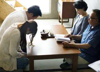 Japanese family paying respect