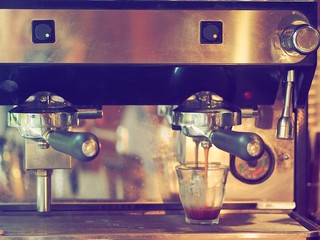 Coffee machine making coffee shot.