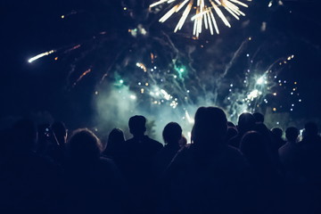 Obraz na płótnie Canvas Crowd watching fireworks