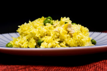Homemade Chinese fried rice with vegetables and fried eggs