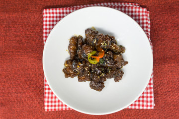 wok fried pork stir fry with sweet peppers and chinese vegetables