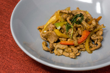 wok fried chicken stir fry with sweet peppers and chinese vegetables