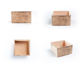 Different point of view of wooden boxes on white background.