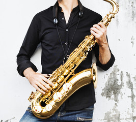 Fototapeta na wymiar A musician with his saxophone