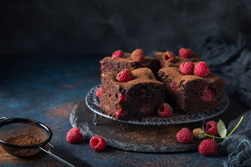 raspberry brownies served  with fresh berries