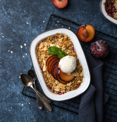 plum oats crumble pie served with ice cream