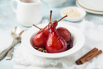 delicious red wine poached pears in spicy syrup