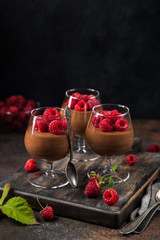 delicious chocolate mousse served with fresh raspberry