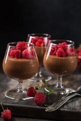 delicious chocolate mousse served with fresh raspberry