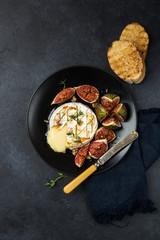camembert cheese baked with  figs, nuts and honey
