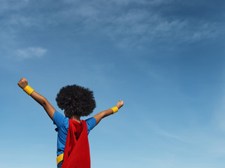 Girl with afro playing superhero © Rawpixel.com