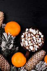 Christmas Food Sweet Marshmallow with Chocolate in Brown Cup on Black Background. Flat Lay