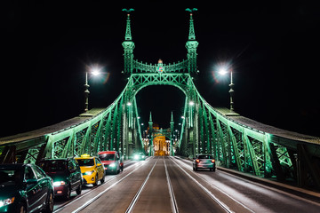 Fototapeta na wymiar Old Iron Bridge across the Danube River in Budapest