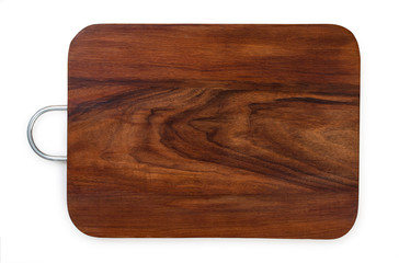 Handmade walnut wood cutting board with metal handle, isolated on a white background, top view.