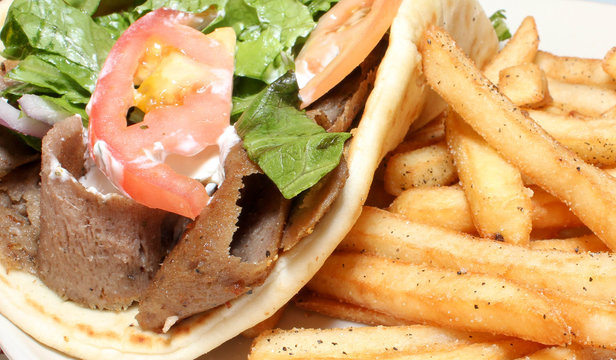 Food with Lettuce, Tomatoes, Meat and Fries