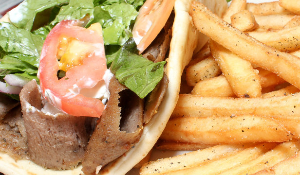 Food with Lettuce, Tomatoes, Meat and Fries