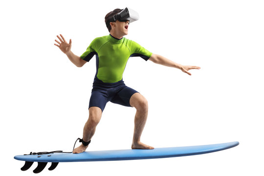 Teenage boy with a VR headset surfing