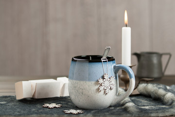 Mug Of Hot Chocolate. Burning Candle. Christmas Decorations.