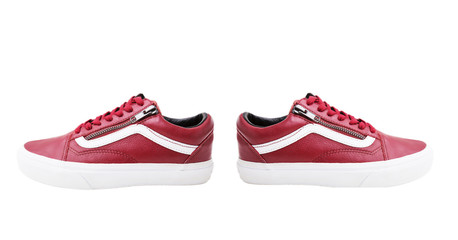 Fashion shoes with shoestring. Red sneaker and shoelace on white background