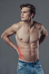 Fototapeta premium Handsome man on grey background