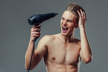 Handsome man on grey background