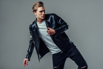 Handsome man on grey background