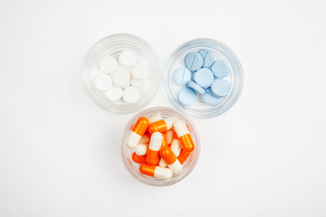 Medications and pills on a white background closeup shot