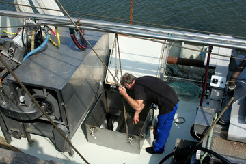 Work on  a shrimp fishing boat