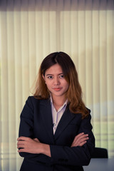 Portrait of asian modern business woman in office vintage style