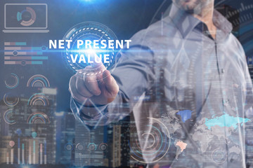 Business, Technology, Internet and network concept. Young businessman working on a virtual screen of the future and sees the inscription: Net present value