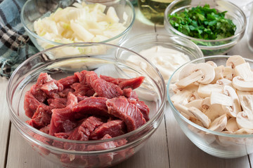Beef and other ingredients ready to cooking beef Stroganoff
