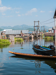 The village on wooden piles of Intha people living over water at Inle lake, Shan state, Myanmar