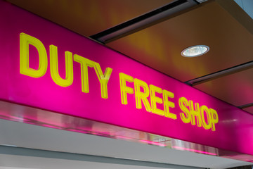 duty free shop sign inside of an international airport