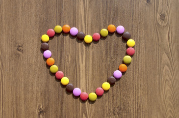 Heart made of colorful candies for bacgrounds